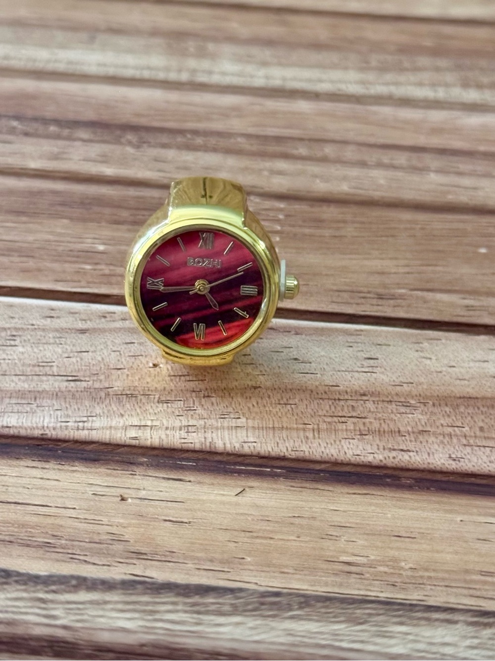 Gold Tone Red Dial Ring Watch